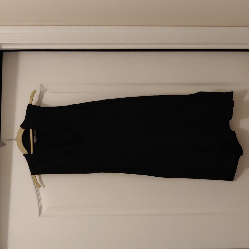 Black dress, fit S,M. Chiffon holter neck line . Chiffon details on the buttom .